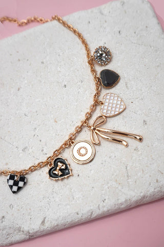 Charmed I'm Sure - Bow, Checker, Heart Necklace