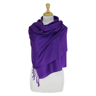 Purple scarf on a mannequin with a white background