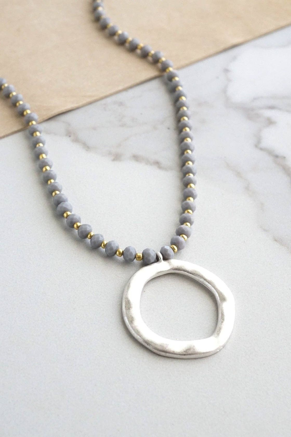 Beaded Necklace with Silver Circle Pendant
