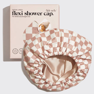 Checkered shower cap with satin lining and packaging on a light background