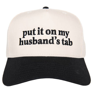 Cap with text 'put it on my husband's tab' on a white background