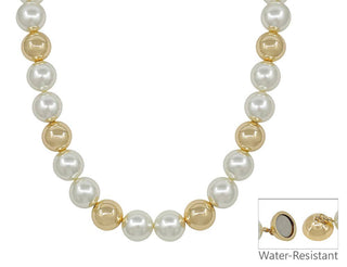A strand necklace made of alternating white pearl-like beads and polished gold-tone round beads, shown on a white background with a small inset close-up of the clasp and the words 'Water-Resistant'.