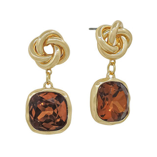 A pair of gold-toned drop earrings featuring a knotted top design and a faceted cushion-cut brown gemstone in a bezel setting, shown against a plain white background.