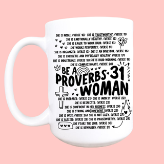 A white ceramic mug with black printed text celebrating a 31st birthday, featuring Bible verses from Proverbs 31, set against a solid pink background.