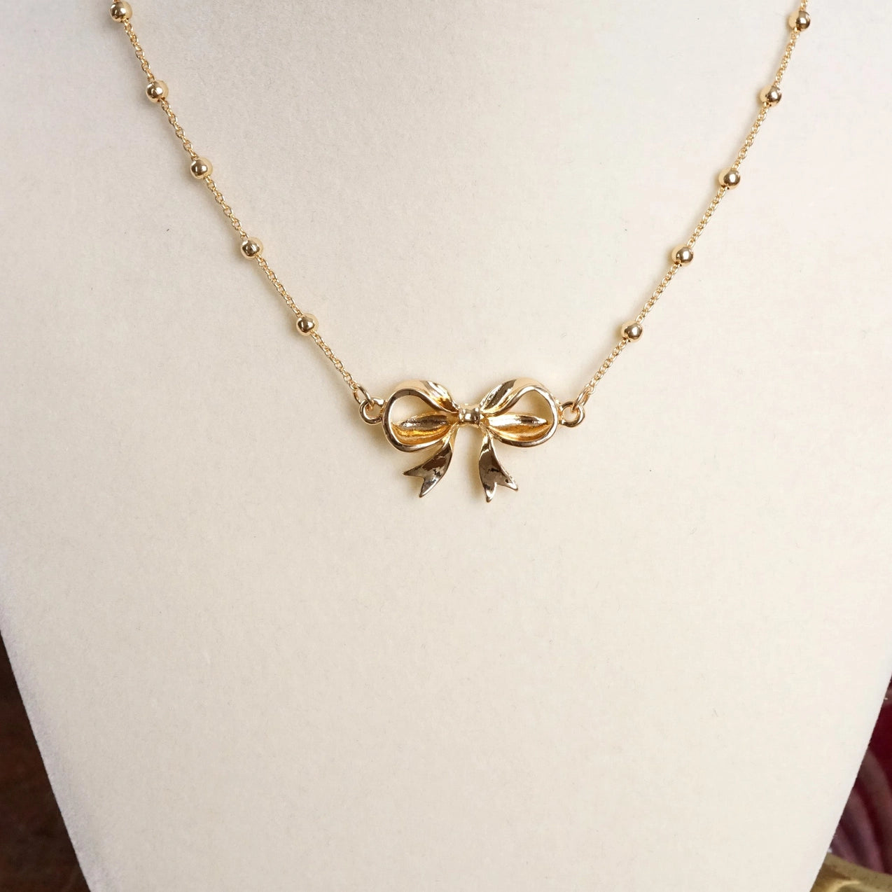 Fancy Bow Necklace - Short Dainty Station Chain in Gold Tone