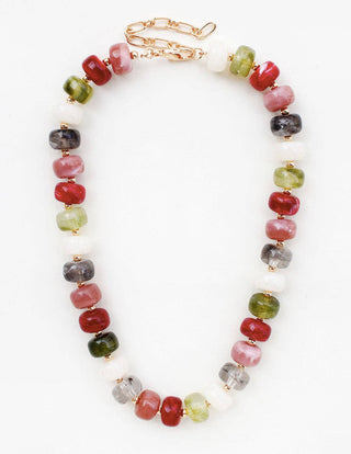 A beaded necklace featuring polished gemstone-like round beads in red, green, white, gray, and black, separated by small gold spacers and connected with a gold chain clasp, shown on a plain white background.