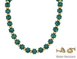 A beaded necklace featuring faceted green beads alternating with small gold-toned spacer beads, shown on a white background with a small inset detail of a gold clasp and the text 'Water-Resistant'.