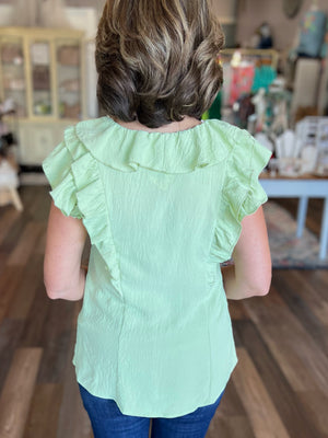 Sleeveless Making Moves Ruffle Detail Top in Sage