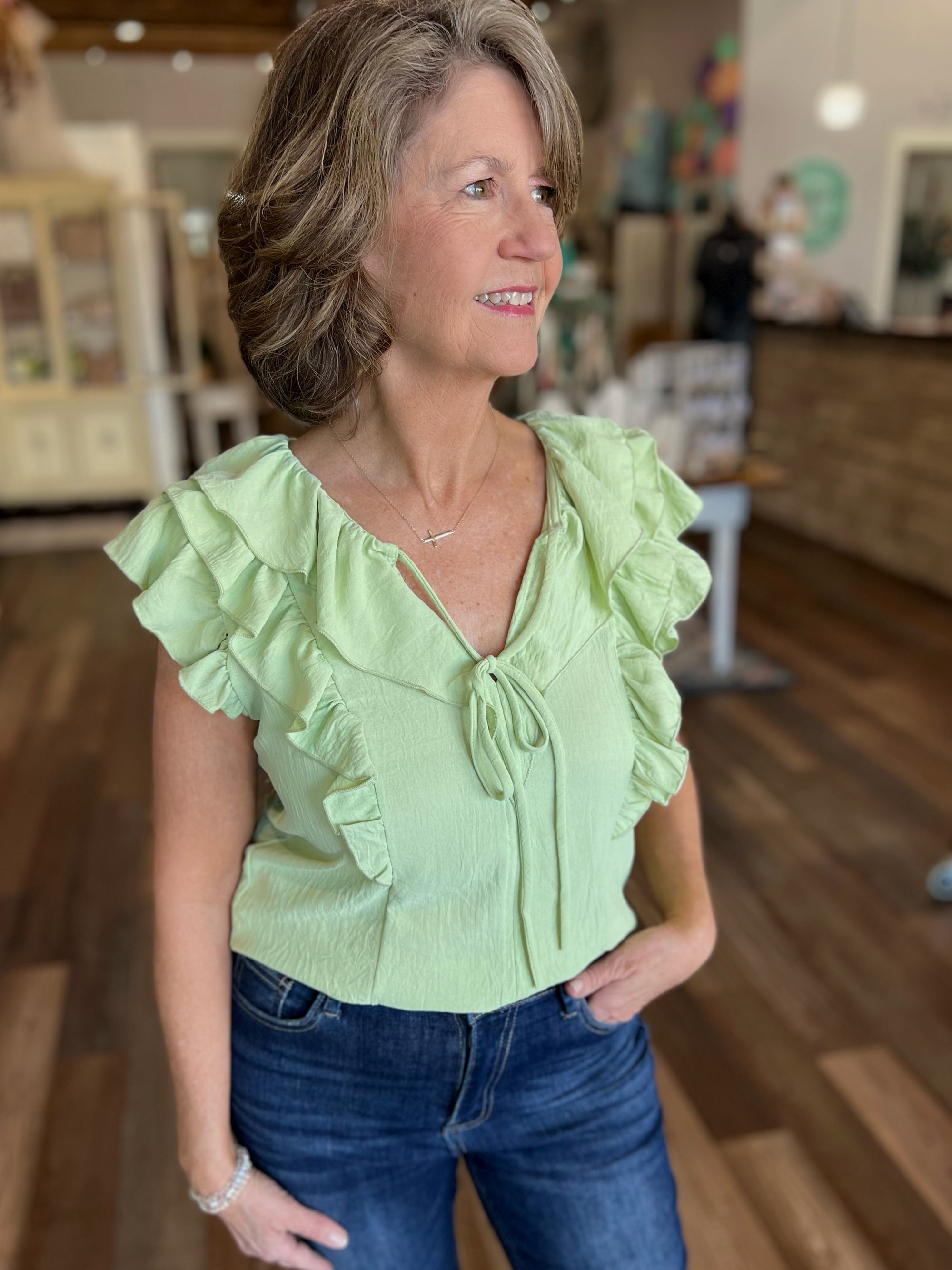 Sleeveless Making Moves Ruffle Detail Top in Sage