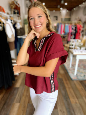 Split Neck Burgundy Top with Animal Print Detail