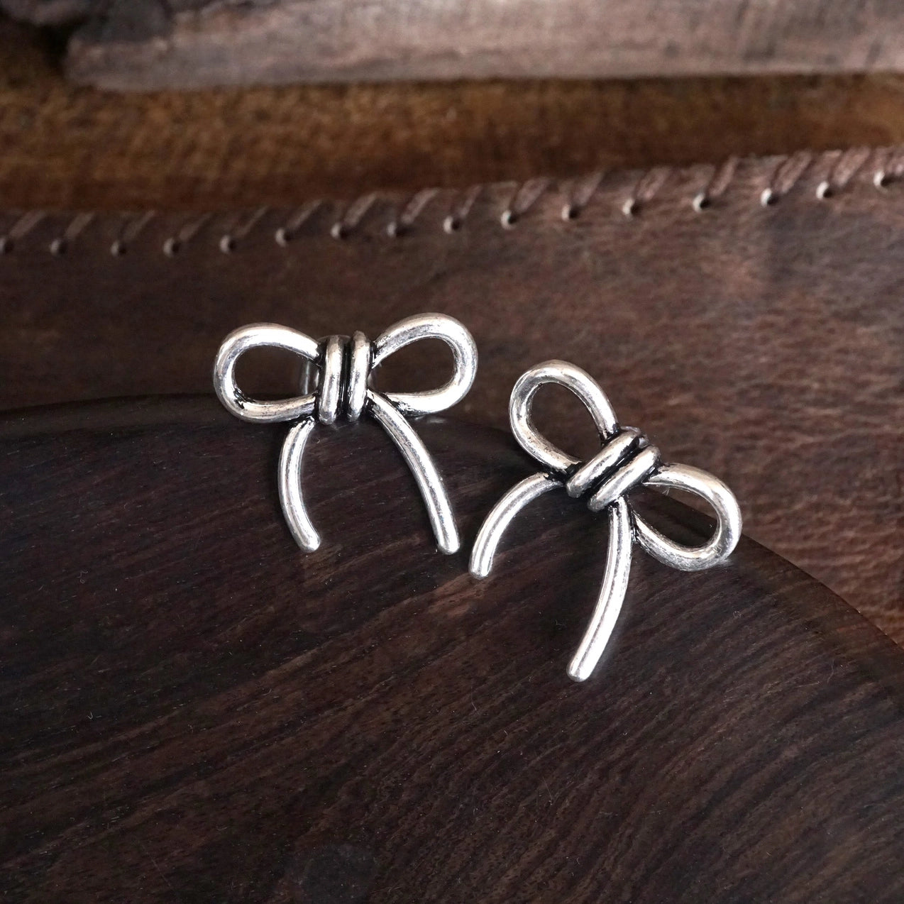 Western Bow Statement Earrings in Silver