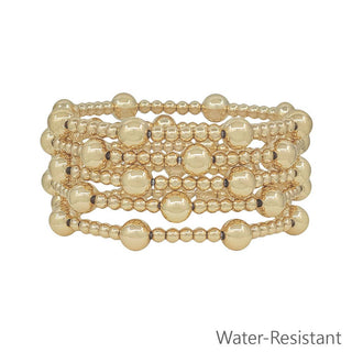 Gold beaded bracelet on a white background with 'Water-Resistant' text.