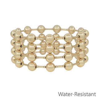Gold beaded bracelet on a white background with 'Water-Resistant' text.
