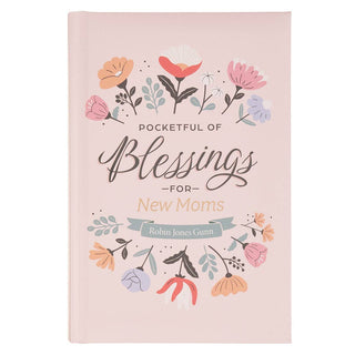 A pink hardcover journal with floral illustrations and the text 'Pocketful of Blessings for New Moms' by Robin Jones Gunn, shown on a plain white background.
